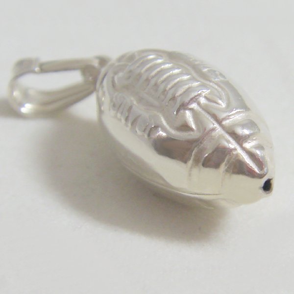 (p1299)Silver pendant in motif Rugby football.